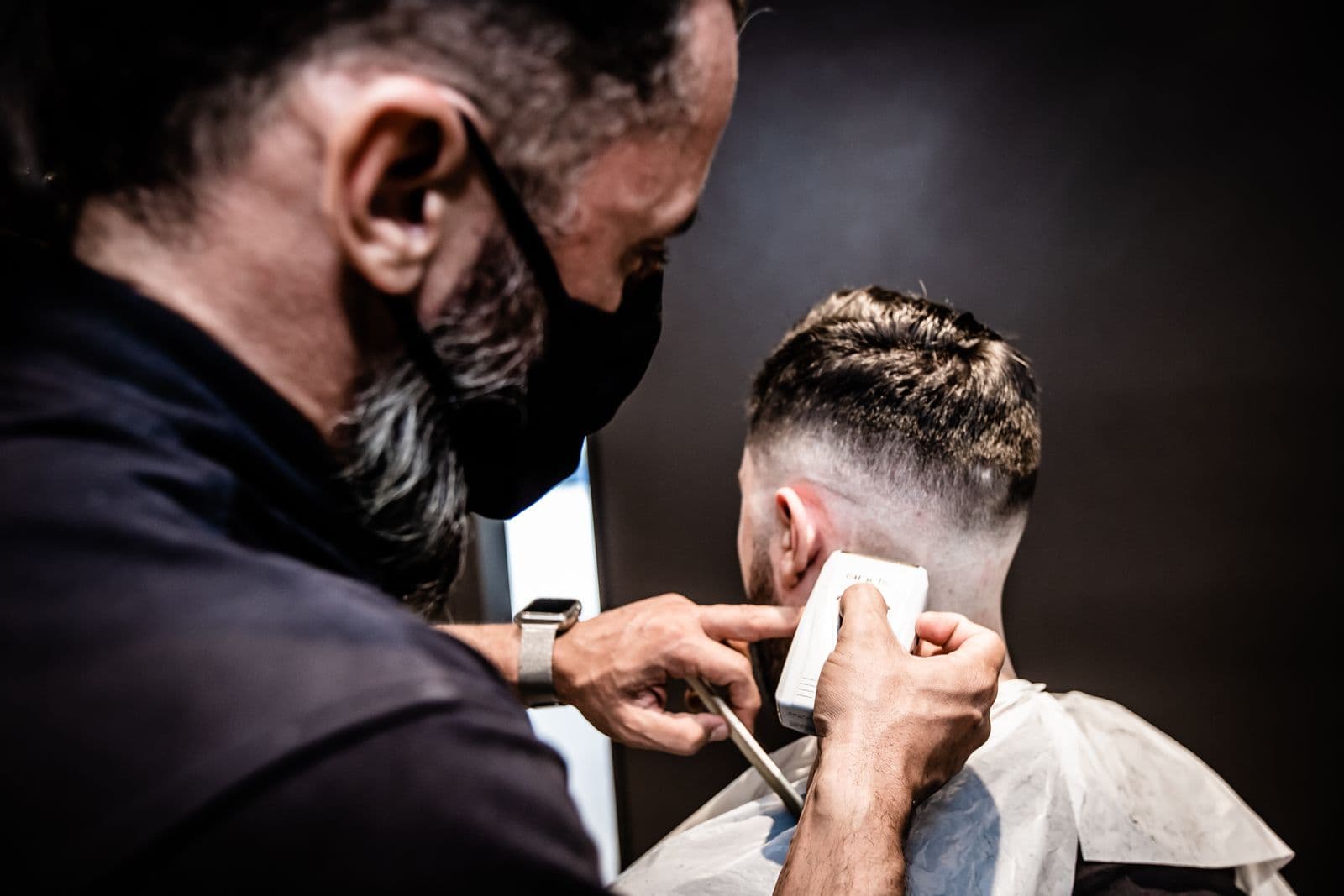 Clipper work on a tight fade