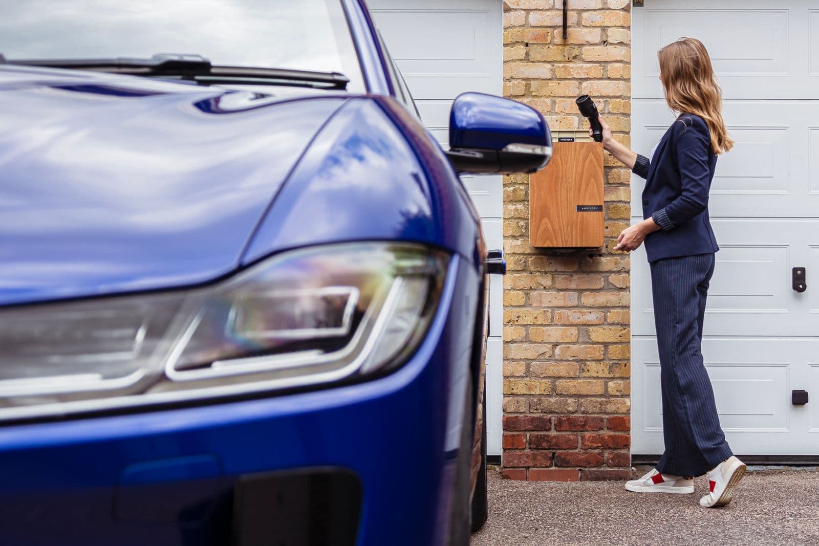 Level-2 EV charger installed on a garage wall