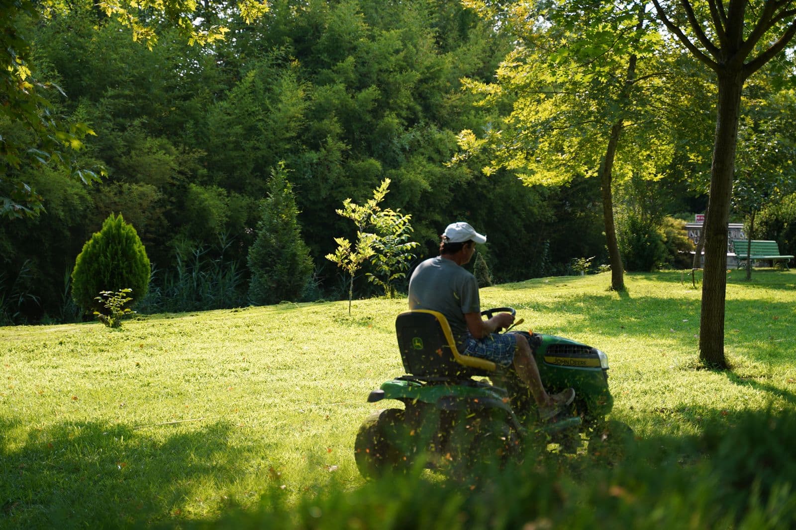 Sweeping estate grounds maintained with a riding mower