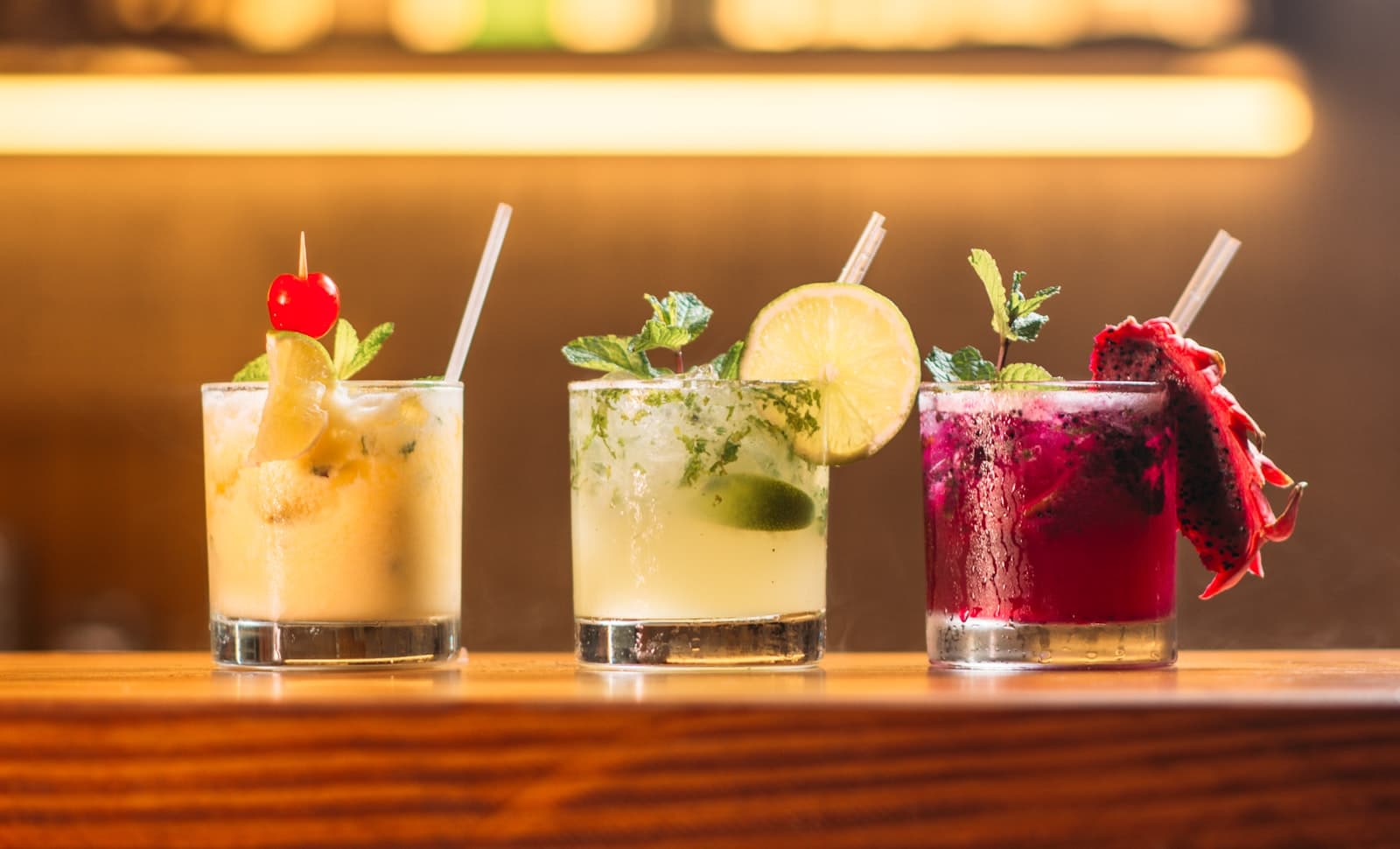 Bright cocktails on a sunny table