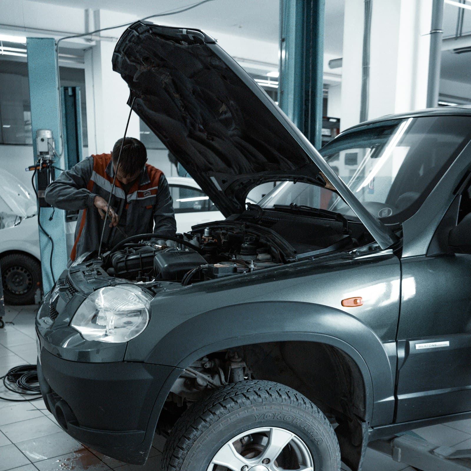 Service bay with a car on the lift