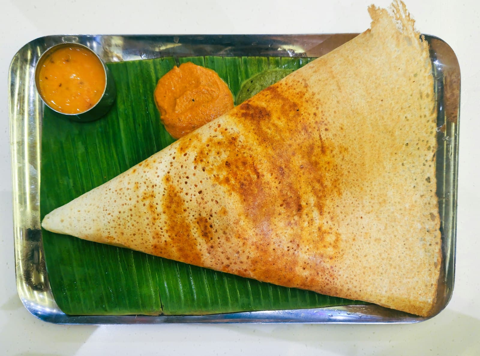 Golden rolled wrap stuffed with spiced filling