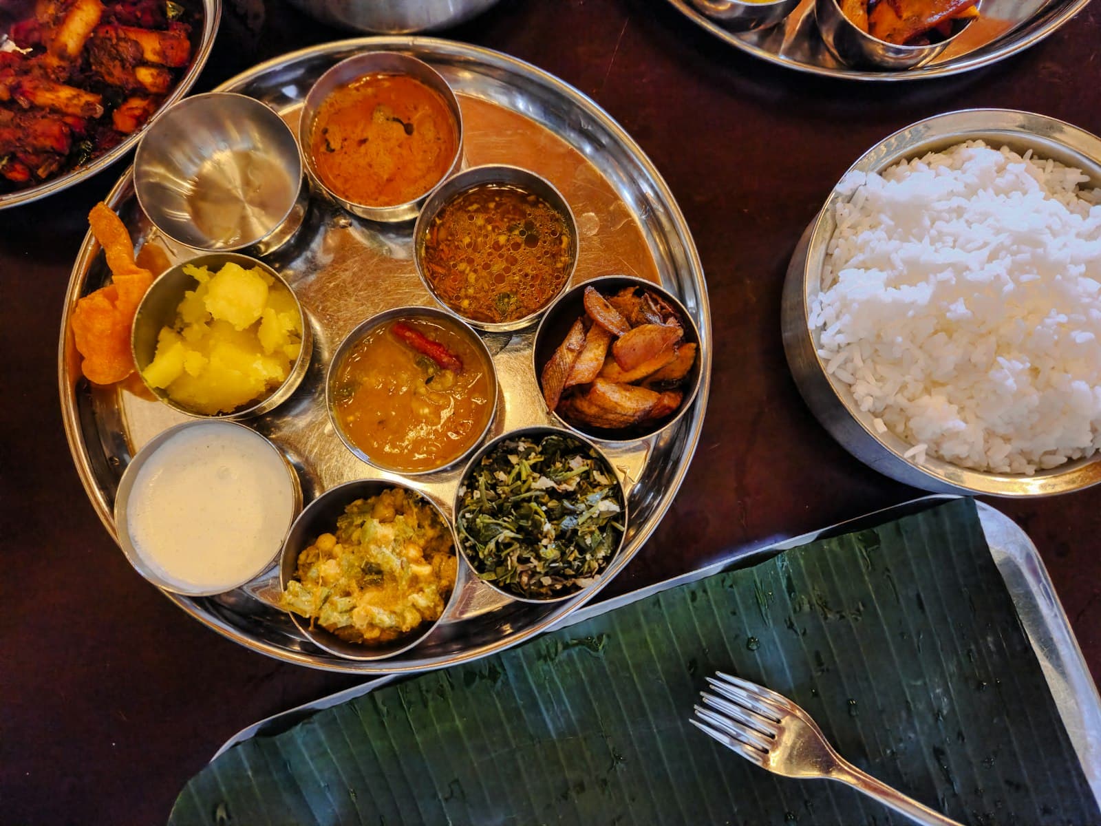 Grand Indian thali with curries, naan and dessert