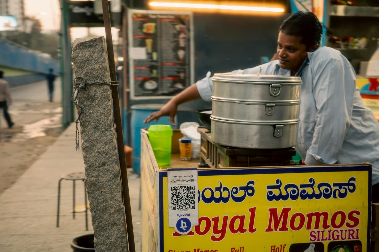 Bustling Kathmandu-style street food stall at night