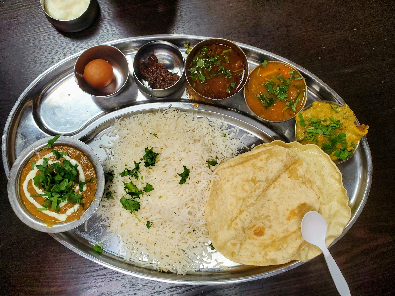 Himalayan thali with curry, dal, rice and sel roti