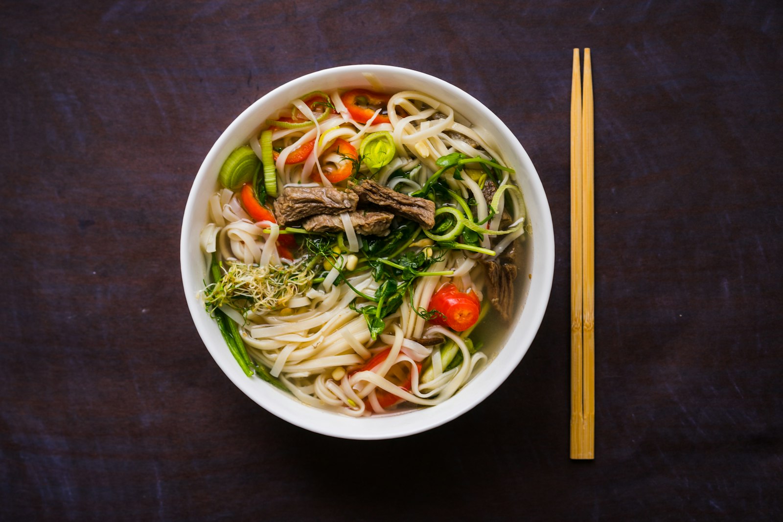 Bowl of chicken thukpa with hand-pulled noodles